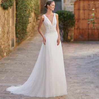 Zarif Dantel ve Tül A-Line düğün elbisesi Klasik V Yaka Kolsuz Bohemia Gelin Plaj Sahil Aç Geri Elbisesi Evlilik için